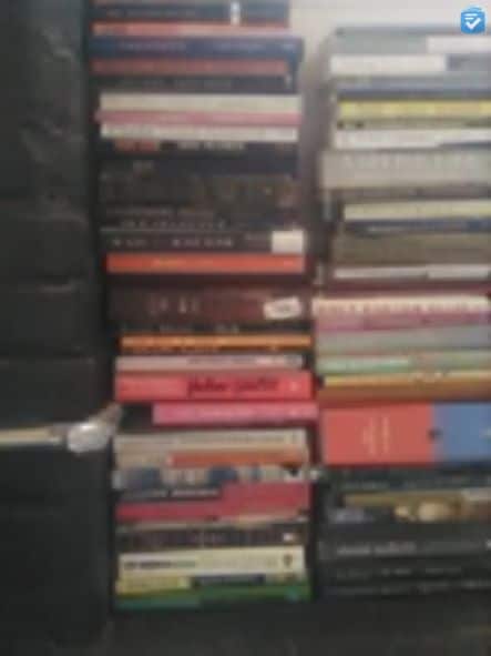 Blurry photos of stacks of books.