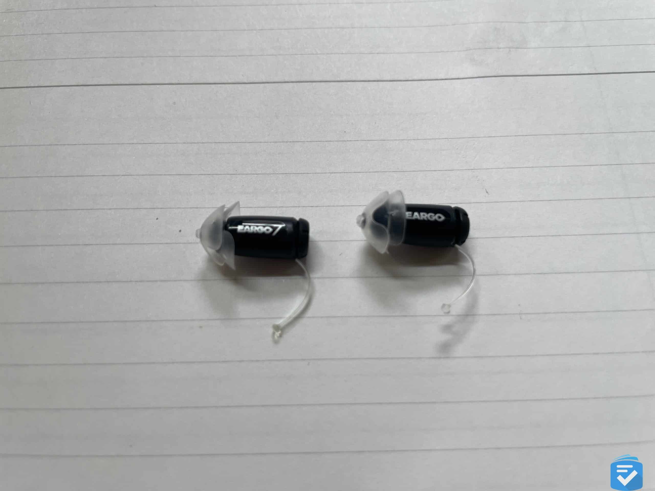 In terms of appearance, Eargo 7 hearing aids (left) look nearly identical to the Eargo 6 (right).