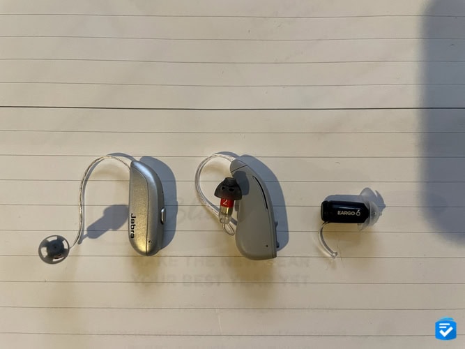 From left to right: Jabra Enhance Select 300, Lexie B2 Plus, and Eargo 6 hearing aids.